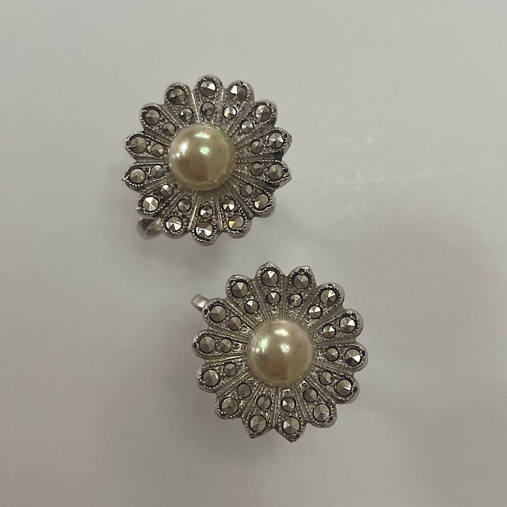Clip on costume jewellery earrings.